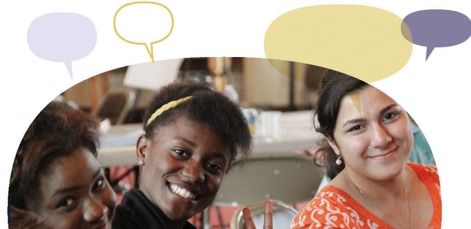 Three young people are sitting together, smiling and facing the camera, with colorful speech bubbles floating above them. The setting appears to be informal, possibly a community gathering or workshop.
